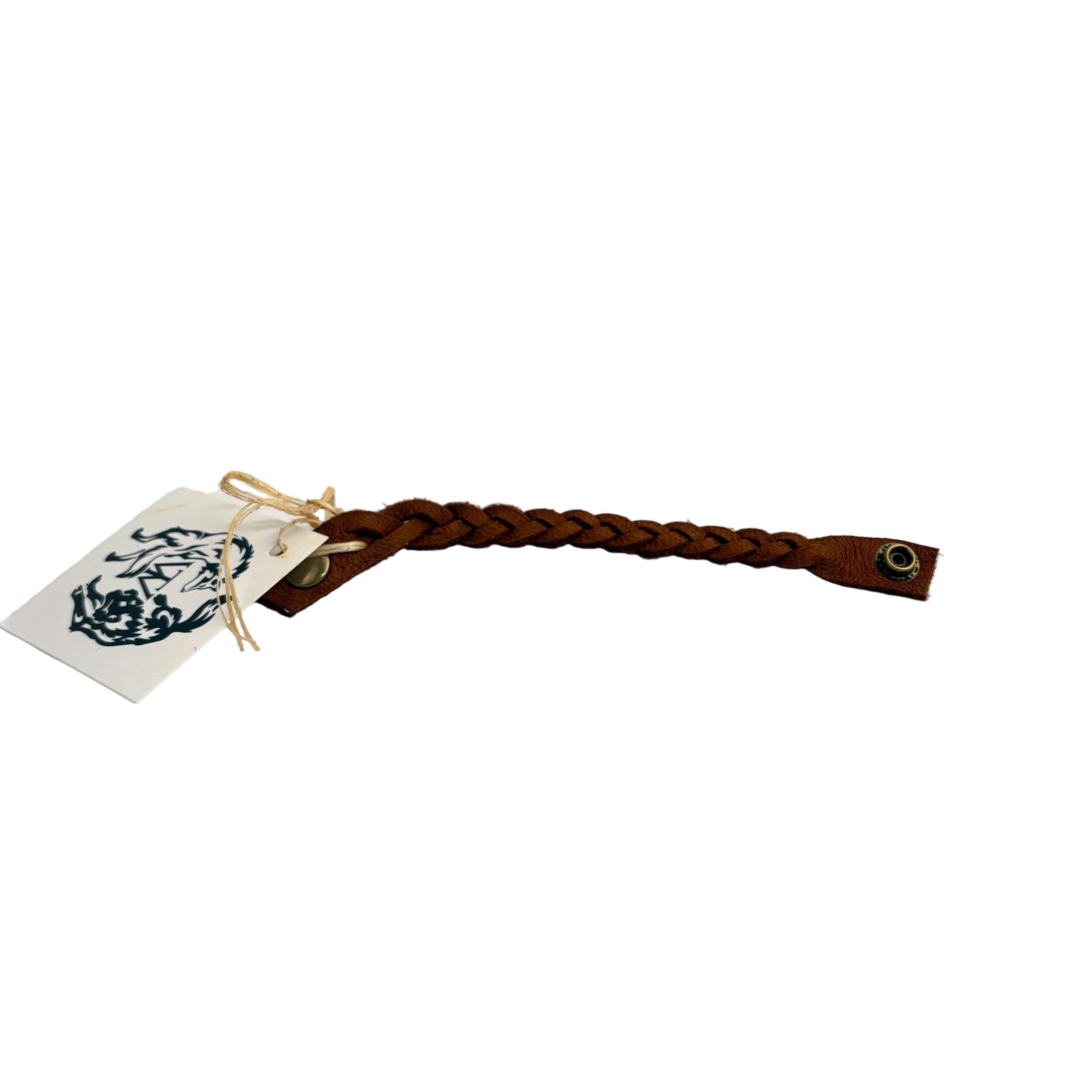 Brown braided leather dog leash with a tag on a light gray background